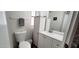 Bright bathroom features a modern vanity with storage and a toilet, creating a clean and functional space at 17200 W Bell Rd # 1622, Surprise, AZ 85374