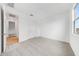 This bedroom features a large window and closet space at 17253 W Via Dona Rd, Surprise, AZ 85387