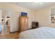 Bedroom with wardrobe and comfortable lighting at 17810 W Club Vista Dr, Surprise, AZ 85374