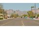 A peaceful street view showing the road, mountain views, and desert landscaping at 1815 S San Marcos Dr, Apache Junction, AZ 85120