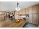 Cozy dining area featuring custom cabinets and modern appliances at 2585 Leisure World --, Mesa, AZ 85206