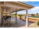 Covered patio with golf course and water views at 2585 Leisure World --, Mesa, AZ 85206