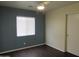 Bedroom featuring a ceiling fan, closet, and window at 2830 W Grenadine Rd, Phoenix, AZ 85041