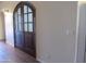 Attractive arched doorway and tile flooring enhance the home's design at 2830 W Grenadine Rd, Phoenix, AZ 85041