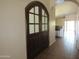 Close-up of the arched doorway, adding character to this light-filled home at 2830 W Grenadine Rd, Phoenix, AZ 85041