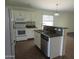 Well-equipped kitchen with granite countertops and stainless steel appliances at 2830 W Grenadine Rd, Phoenix, AZ 85041