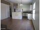 Open living area connecting kitchen and living spaces, offering seamless transition at 2830 W Grenadine Rd, Phoenix, AZ 85041