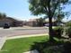 Charming homes line a quiet street with well-maintained lawns at 2830 W Grenadine Rd, Phoenix, AZ 85041