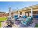 Inviting patio area with comfortable seating, perfect for relaxing outdoors and enjoying the sunshine at 3028 E Highland Ave, Phoenix, AZ 85016