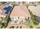 Aerial view of a private backyard featuring a dining area and lounge seating on a paved patio at 36518 N Crucillo Dr, Queen Creek, AZ 85140