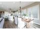 Bright dining area with lots of natural light and open kitchen concept at 36518 N Crucillo Dr, Queen Creek, AZ 85140