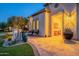 Inviting home entrance with brick pavers and decorative potted plants at 36518 N Crucillo Dr, Queen Creek, AZ 85140