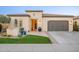 Charming single-story home featuring a well-manicured lawn and neutral-toned exterior at 36518 N Crucillo Dr, Queen Creek, AZ 85140