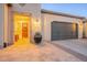 Stylish home entrance with a welcoming front door, tiled walkway, and manicured landscaping at 36518 N Crucillo Dr, Queen Creek, AZ 85140