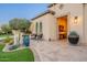 Charming front porch featuring an outdoor seating area with desert landscaping at 36518 N Crucillo Dr, Queen Creek, AZ 85140