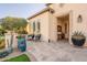 Inviting front porch featuring outdoor seating, plants, and stylish decor, adding to the home's curb appeal at 36518 N Crucillo Dr, Queen Creek, AZ 85140