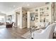 A cozy living space featuring custom built-in shelving and an inviting seating area at 36518 N Crucillo Dr, Queen Creek, AZ 85140