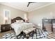 The main bedroom features a ceiling fan, plantation shutters, and ensuite bathroom at 36518 N Crucillo Dr, Queen Creek, AZ 85140