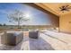 Covered patio featuring a retractable sun shade and outdoor seating with great views at 36518 N Crucillo Dr, Queen Creek, AZ 85140