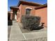 Inviting single-story home featuring desert landscaping, a walkway to the front door, and privacy shrubs at 36610 W Picasso St, Maricopa, AZ 85138