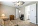 Comfortable bedroom featuring neutral walls, carpet flooring, and a ceiling fan at 38101 W Santa Maria St, Maricopa, AZ 85138