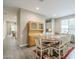 Inviting dining area with a stylish hutch and easy access to the open kitchen at 38101 W Santa Maria St, Maricopa, AZ 85138