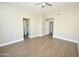 Spacious bedroom featuring neutral tones and ceiling fan at 4002 E Rockwood Dr, Phoenix, AZ 85050