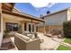 Private backyard featuring a fire pit, and covered patio for relaxing or entertaining guests at 4041 W Cielo Grande --, Glendale, AZ 85310