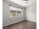 Bedroom with hardwood floors, neutral paint, a ceiling fan, and a view of a backyard at 4041 W Cielo Grande --, Glendale, AZ 85310