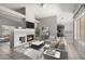 Cozy living room showcasing the fireplace, tile floors, and neutral paint throughout at 4041 W Cielo Grande --, Glendale, AZ 85310