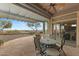 Backyard patio with a dining table and desert view at 42123 N Long Cove Way, Anthem, AZ 85086