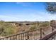 Scenic view of desert landscape and mountains overlooking backyard pool at 42123 N Long Cove Way, Anthem, AZ 85086