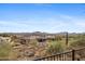 Beautiful backyard view with pool and mountain views at 42123 N Long Cove Way, Anthem, AZ 85086