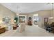 Spacious living room bathed in natural light, complemented by stylish furnishings at 42123 N Long Cove Way, Anthem, AZ 85086