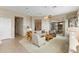 Inviting living room with a ceiling fan, neutral decor, and sliding glass doors to the patio at 42123 N Long Cove Way, Anthem, AZ 85086