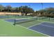 Well-maintained pickleball courts with desert landscaping in a beautiful setting at 42123 N Long Cove Way, Anthem, AZ 85086