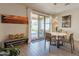 Bright dining area with sliding glass doors leading to outdoor patio, blending indoor and outdoor living at 4332 N 197Th Dr, Litchfield Park, AZ 85340