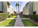 Exterior courtyard featuring lush landscaping and walkways, offering a serene environment at 4610 N 68Th St # 472, Scottsdale, AZ 85251