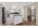 Kitchen featuring a butcher block island, white cabinets, and stainless steel appliances at 4619 E Farmdale Ave, Mesa, AZ 85206