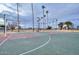 Community park featuring two colorful and well-maintained basketball courts at 5223 W Acoma Dr, Glendale, AZ 85306