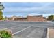 View of eCampus Academy school building with parking lot at 5223 W Acoma Dr, Glendale, AZ 85306