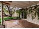 Charming covered patio featuring greenery and a view of the backyard at 6036 E Windsor Ave, Scottsdale, AZ 85257