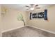 Charming bedroom decorated with celestial themed elements and cozy carpet flooring at 6036 E Windsor Ave, Scottsdale, AZ 85257