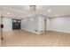 Large living room with tile flooring, double door entry, and recessed lighting providing ample space at 6036 E Windsor Ave, Scottsdale, AZ 85257