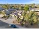 Aerial view showcasing the home's architecture, landscaping, and neighborhood at 686 E Vermont Dr, Gilbert, AZ 85295