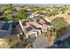 Aerial view showcasing the home's architecture, landscaping, and neighborhood at 686 E Vermont Dr, Gilbert, AZ 85295