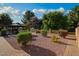 Expansive backyard showcasing a charming gazebo and lush landscaping, perfect for outdoor enjoyment at 7216 W Country Gables Dr, Peoria, AZ 85381