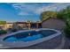 Sparkling private pool offering a refreshing oasis with desert landscaping at 7216 W Country Gables Dr, Peoria, AZ 85381