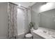 This bathroom features a shower, vanity, neutral color palette and decorative accents at 738 W Kingman Dr, Casa Grande, AZ 85122