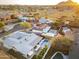 Overhead view showcasing the surrounding neighborhood, offering a glimpse of nearby parks and houses at 8114 E Arlington Rd, Scottsdale, AZ 85250